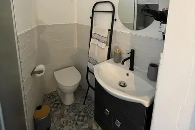 a small bathroom with a sink and a toilet at 