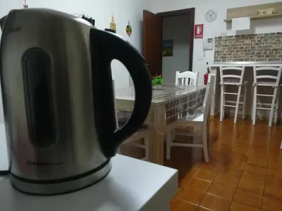 a coffee pot sitting on a counter in a kitchen at La Dimora dei sette Arcangeli in Palermo