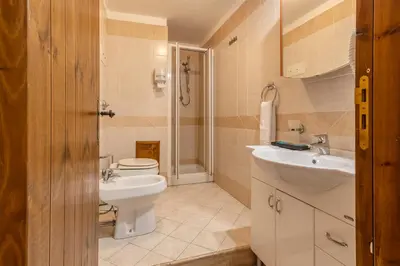 a bathroom with a toilet and a sink at Hotel Castello di Giuliano in Montelepre