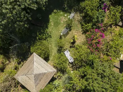 an overhead view of a garden with plants and flowers at Apartment Cicladi Tinos by Interhome in Santa Flavia
