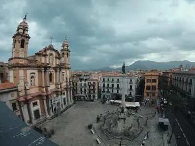 a view of a city with a cathedral and a fountain at BB45 in Palermo