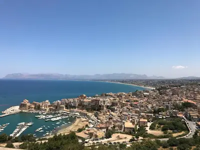 an aerial view of a town on the shore of a lake at Antico Canale in Castellammare del Golfo