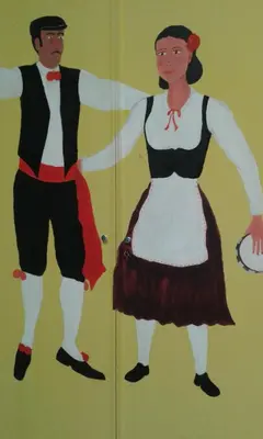 a painting of a man and a woman in a dress at L'Aquilone B&B in Palermo