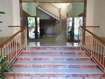 a set of stairs in a building with a stair case at Dante 58 in Palermo
