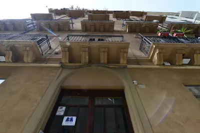 an overhead view of a building with a sign on it at B&B Le Porte Del Centro in Palermo