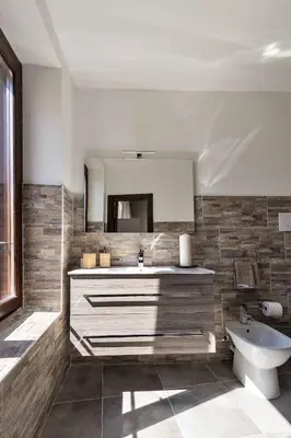 a bathroom with a sink and a mirror at Casa Nostra B&B in Palermo