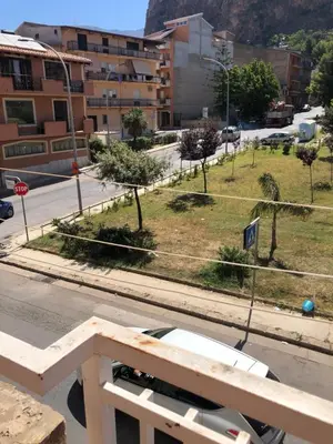 a view of a city street with a park at Appartamento Vacanza Luna in Partinico