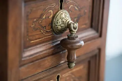 a wooden door with a brass door knocker on it at B&B Attico 33 in Palermo
