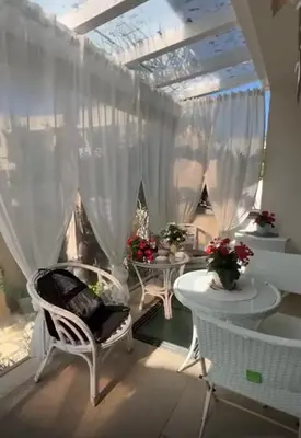 a room with two tables and chairs and a window at Cima Bianca in San Vito lo Capo