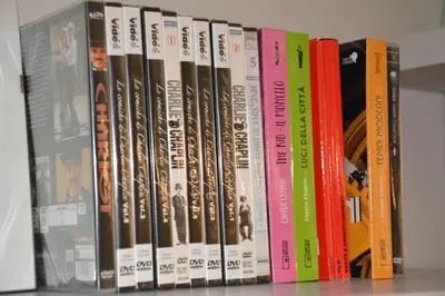 a row of books sitting on a shelf at Luci della città Palazzo San Matteo in Palermo