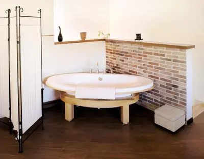 a bedroom with a bed and a sink and a window at Case Vacanza Cipriano spacious apartment and cosy studio monolocale in Torretta
