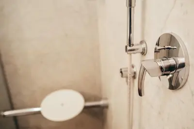a shower with a mirror in a bathroom at Hotel Porta Felice & Spa in Palermo
