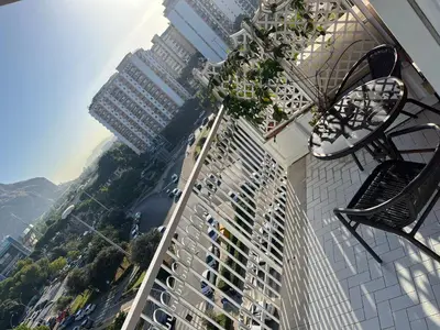a view of a tall building with plants on it at Favorita suites in Palermo