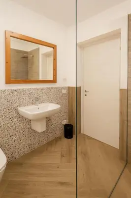 a bathroom with a sink and a mirror at Matilde Boutique Hotel by AR Group Hotels in Isola delle Femmine