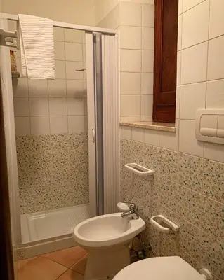 a bathroom with a shower and a toilet and a sink at A 'Du Passi in Castellammare del Golfo