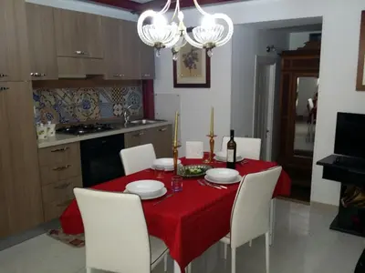 a table with a breakfast of food and drinks at La casetta di Tilde in Termini Imerese