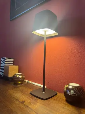a lamp sitting on top of a wooden table at Palace Bed & Breakfast in Salaparuta