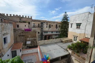 an overhead view of an old city with buildings at Palazzo Torre Apartment in Palermo