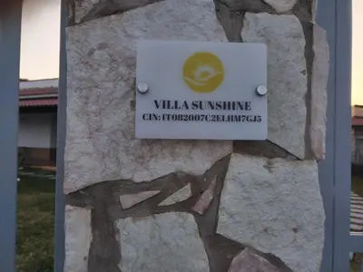 a sign on the side of a stone building at Villa Sunshine in Balestrate
