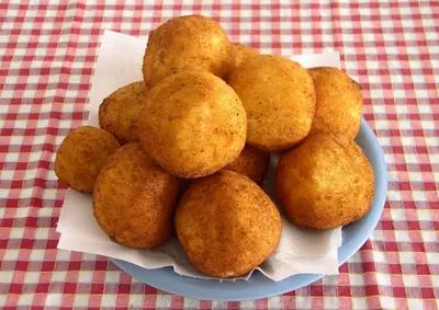 a plate of fried food on a table at Villa Pinella in Palermo