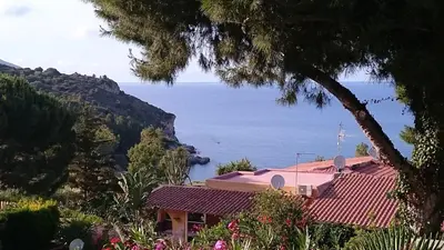a house with a view of the ocean at Azzurra Tresor in Scopello