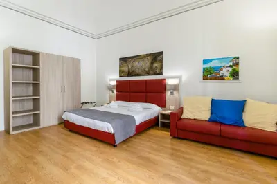 a shelf with products and a bottle of water on it at Belmonte102 Esclusive Suites in Palermo