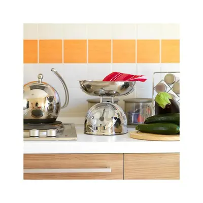 a kitchen counter with two pans on a stove at 4Canti Case Vacanze in Castellammare del Golfo