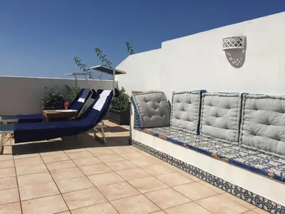 a patio with a slide and a swing at Blu Marea in Macari