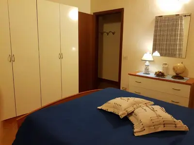 a bedroom with a bed with a pillow on it at casa Barone in Balestrate