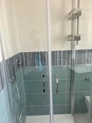 a shower with a glass door in a bathroom at Profumo di Mare 1 in Alcamo Marina