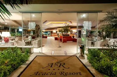 an acacia resort lobby with a reception area at Acacia Resort in Campofelice di Roccella