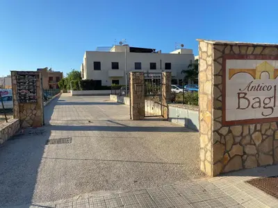 a gate with a sign that reads winter bakery at Case vacanza Cristina site in Antico Baglio e in via Abruzzi n 161 in San Vito lo Capo