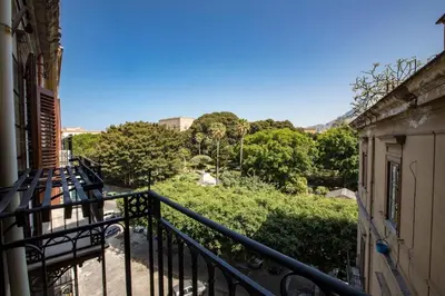 a balcony of a house with a view at Vittorio Emanuele Appartamenti in Palermo