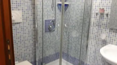 a bathroom with a shower and a sink at Appartamentino Cinisi in Cinisi