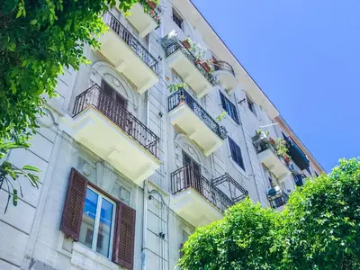 an apartment building with balconies and windows at Sammartino suite in Palermo