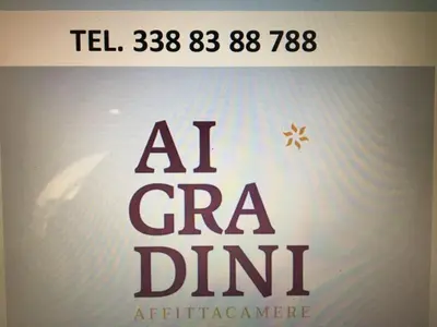 a sign that reads at cra dinitisurance at Ai Gradini Affittacamere in Castellammare del Golfo