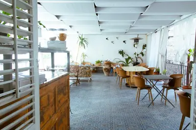 a dining room with a table and chairs at Artisan Maison Palermo in Palermo