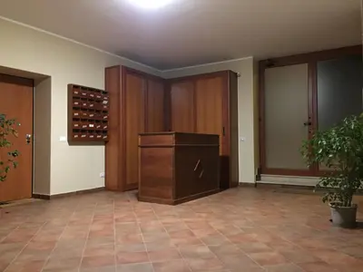 a room with wooden cabinets and a wine cellar at palermo casa vacanze in Palermo