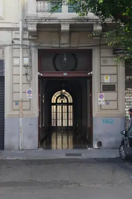 an entrance to a building with a gate at KMC suites - Yellow in Palermo