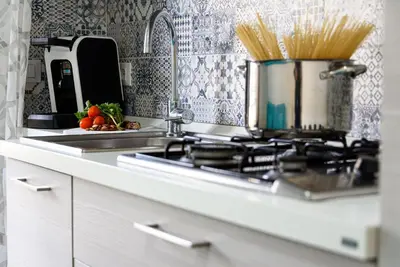 a kitchen stove with a pot on top of it at Casa Francesco in San Vito lo Capo