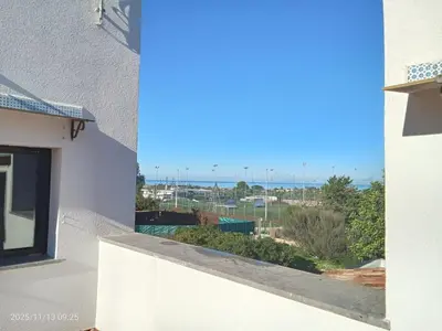 a view from a balcony of a white building at Villa Amalia - mansarda B&B in Cinisi