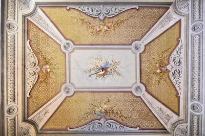 a ceiling with a painting of a woman on it at Al Massimo Piacere in Palermo