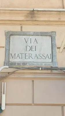 a sign on a building that says vla del marlez at David house alla Vucciria in Palermo