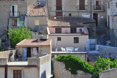 a view of roofs of buildings in a city at Villetta in Centro Storico in Caccamo