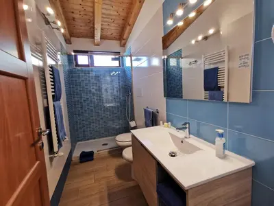 a bathroom with a sink and a toilet at Al Baglio in Mondello