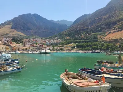 a group of boats docked in a body of water at Alice's Apartment in Castellammare del Golfo