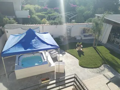 an aerial view of a blue tent in a backyard at Villa Eco-Chic in Carini
