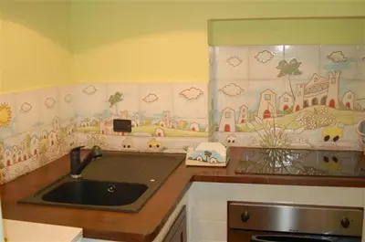 a kitchen with a sink and a counter top at Locanda Re Ruggero in Monreale