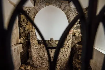 a view through a gate of a castle through a window at Atmosfere Puniche b&b in Palermo