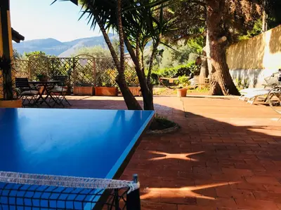 a blue table with a star on a patio at Villa Rosemada, Mondello in Palermo